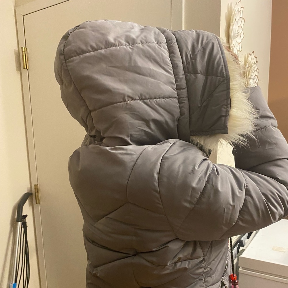 Nice heavy Jessica Simpson winter coat with a big fur hood!